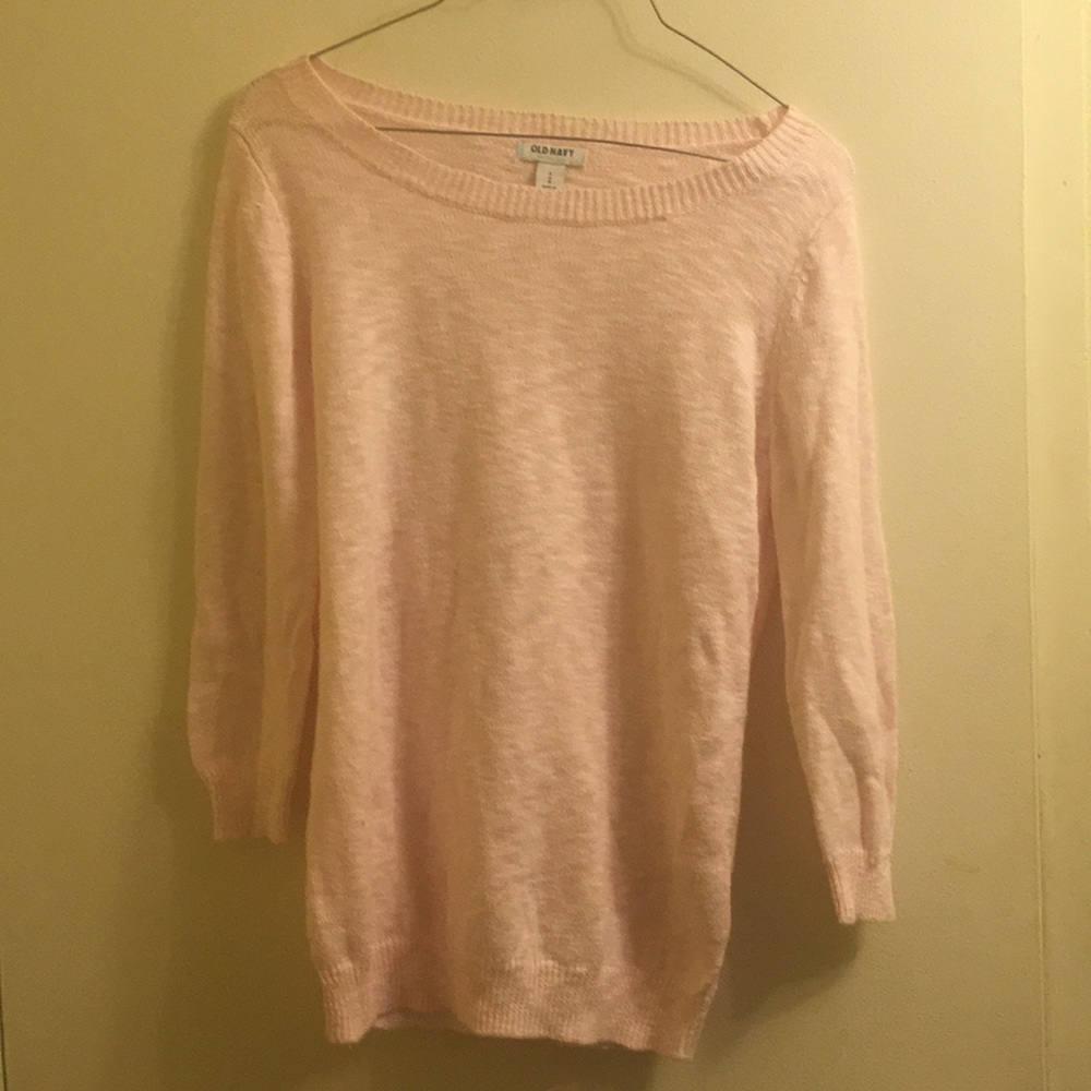 A pink sweater